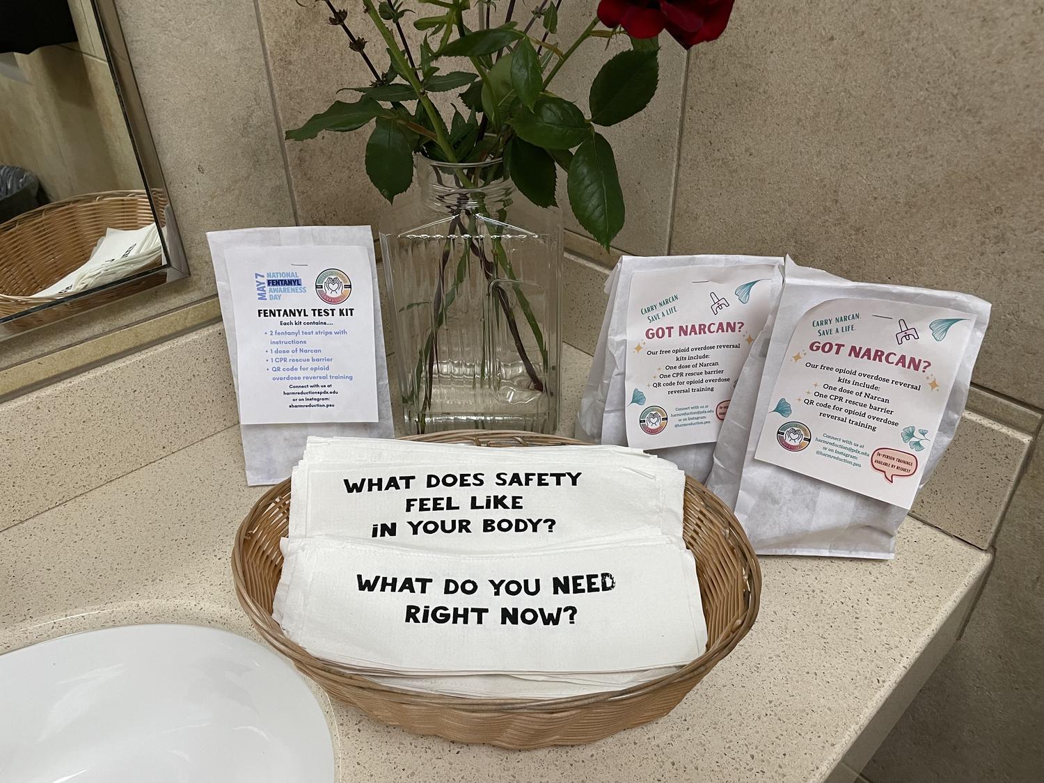 screenprinted papertowels, roses, and safer drug use supplies