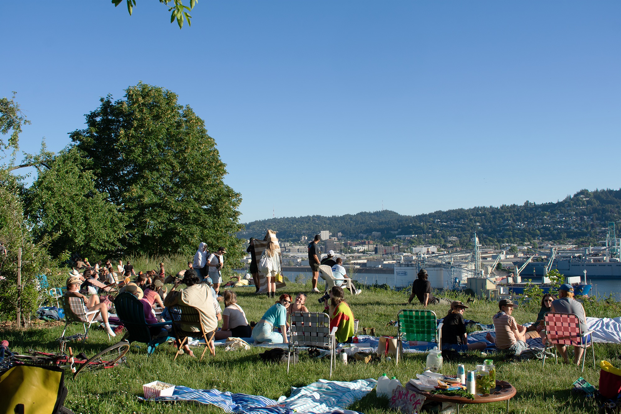 a large group of people observing the sun